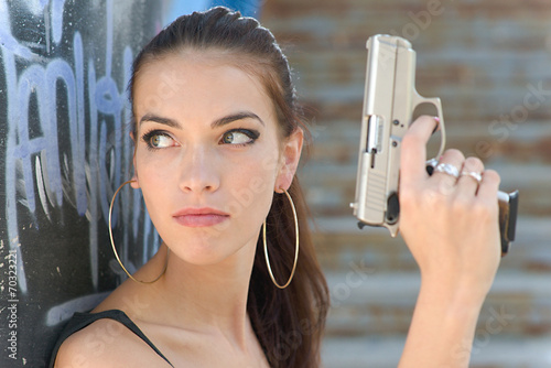 Fotografie, Tablou beautiful sexy girl holding gun