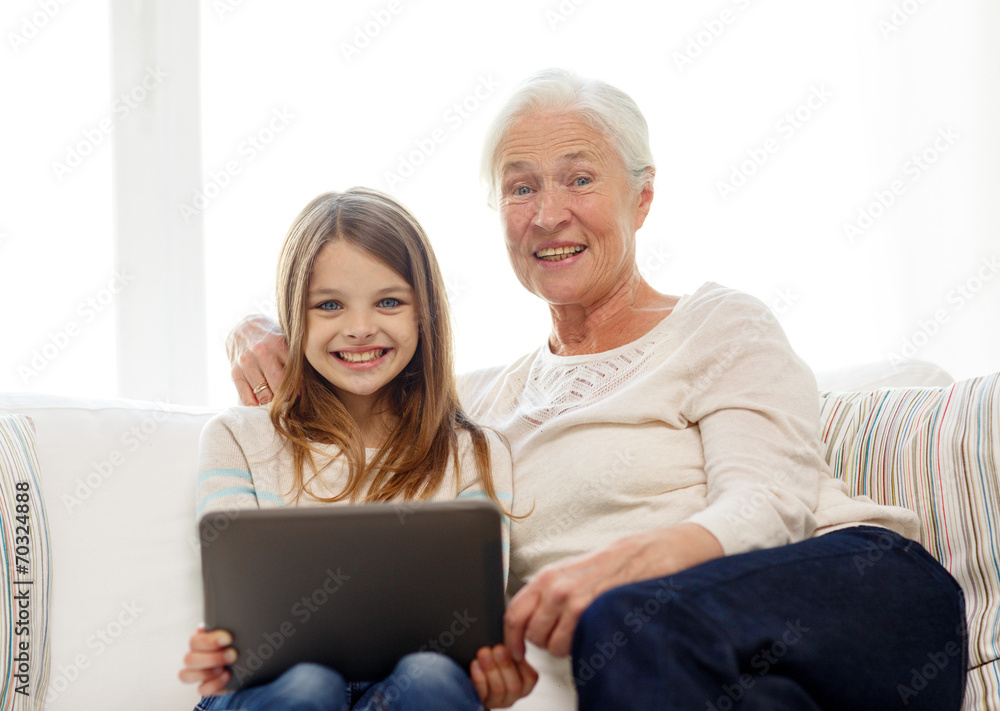 smiling family with tablet pc at home smiling family with tablet pc at home