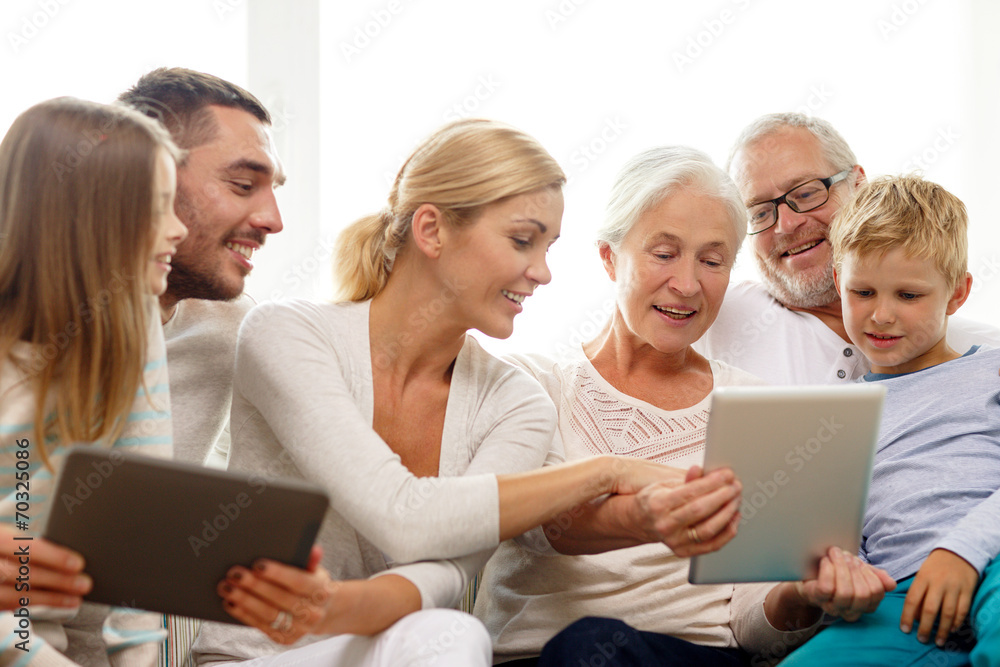 smiling family with tablet pc at home smiling family with tablet pc at home
