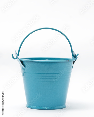 Small blue colored empty bucket isolated in white