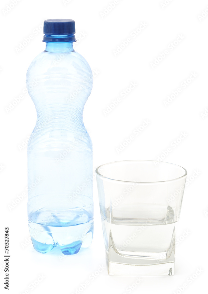 Fototapeta premium Bottle of water with glass