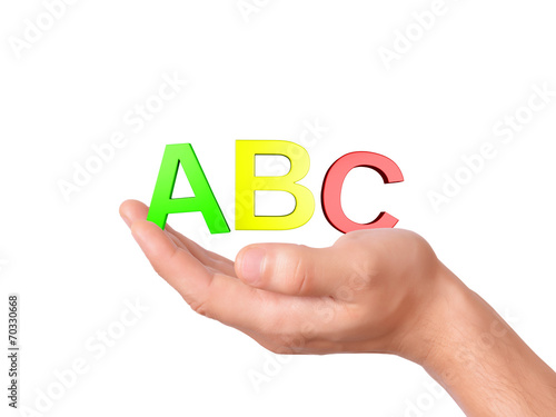 hand holding letters ABC symbol on white Background