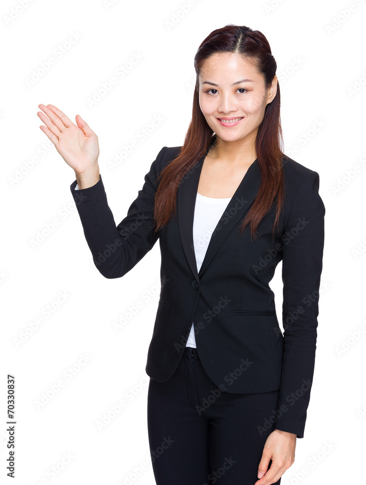 Asian businesswoman with hand present Asian businesswoman with hand present