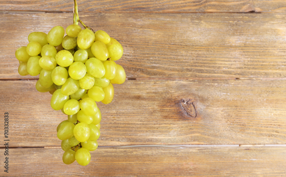 Bunch of grape on wooden background Bunch of grape on wooden background