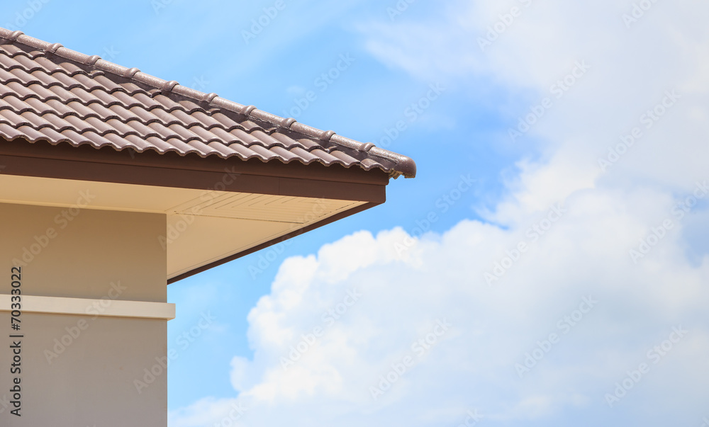 roof under construction with stacks of roof tiles for home build roof under construction with stacks of roof tiles for home build
