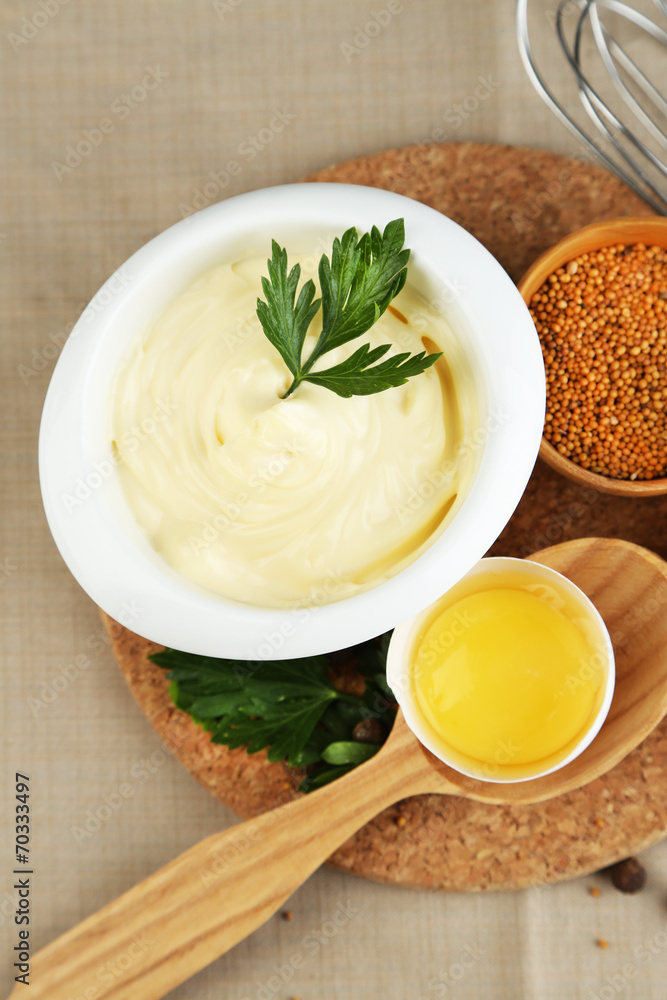 Mayonnaise ingredients on wooden background Mayonnaise ingredients on wooden background