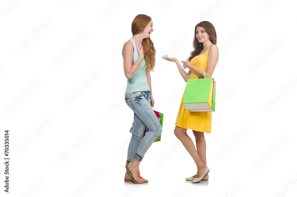 Friends with shopping bags isolated on white Friends with shopping bags isolated on white