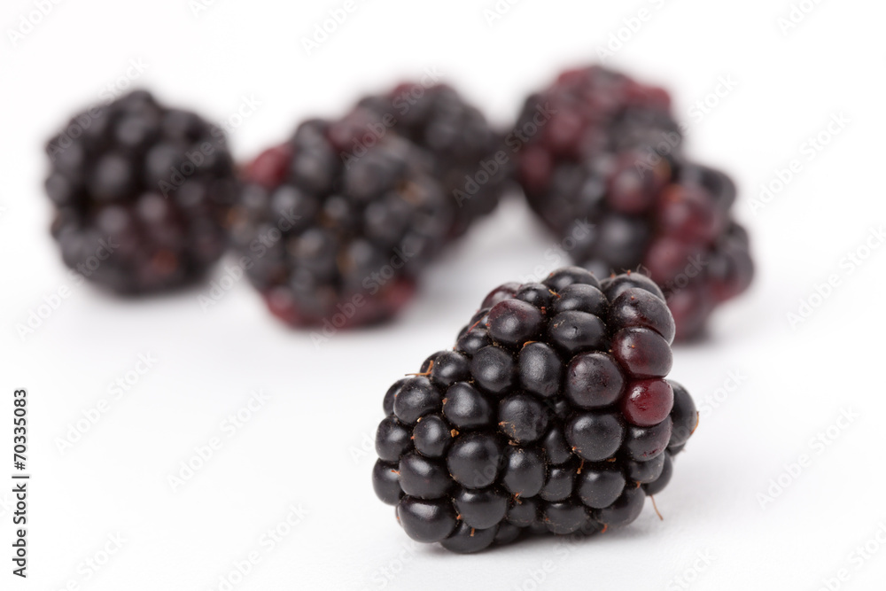 Sweet ripe blackberries isolated on white background. Sweet ripe blackberries isolated on white background.