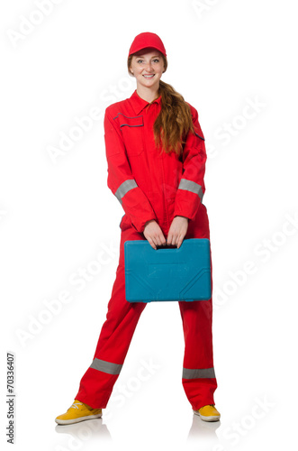 Woman construction worker in red coveralls on white