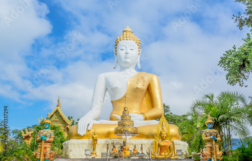 Gold buddha statue in thai temple, Thailand