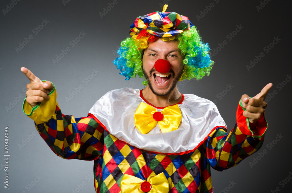 Funny clown in colourful costume Funny clown in colourful costume