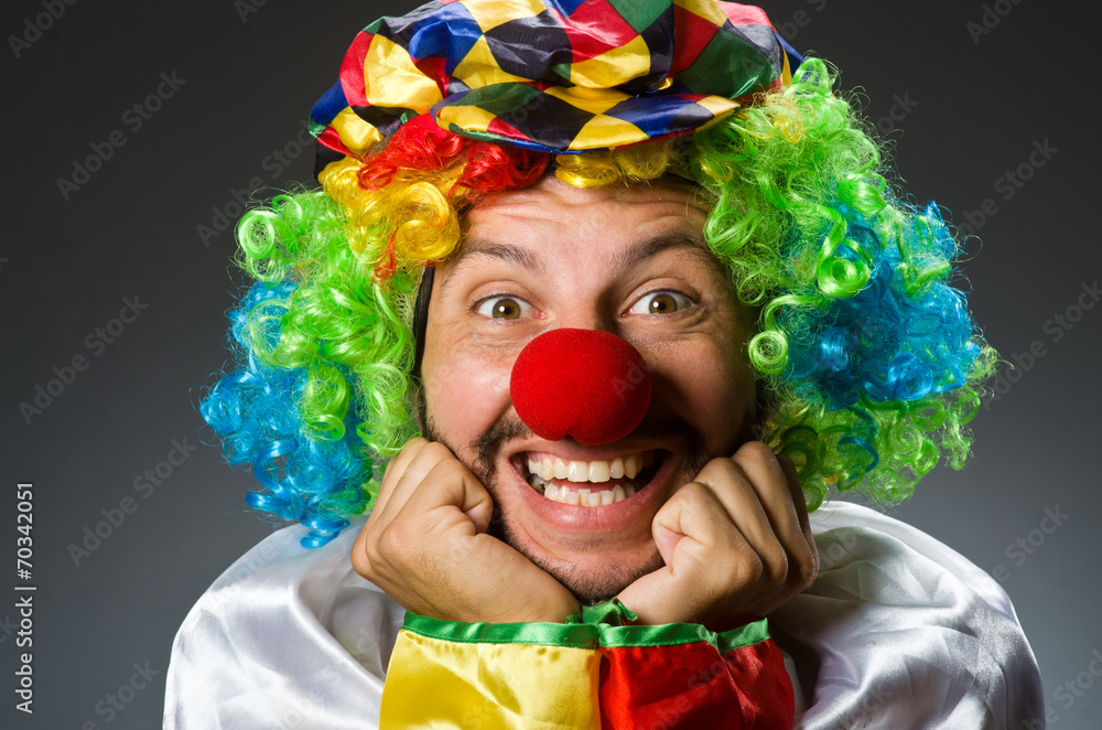 Funny clown in colourful costume Funny clown in colourful costume