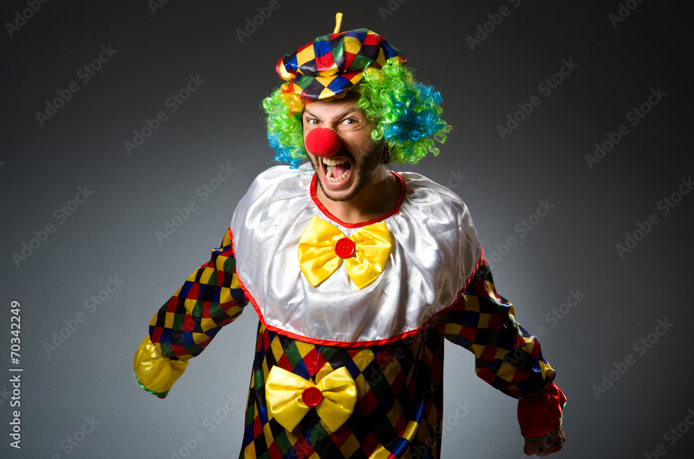 Funny clown in colourful costume Funny clown in colourful costume