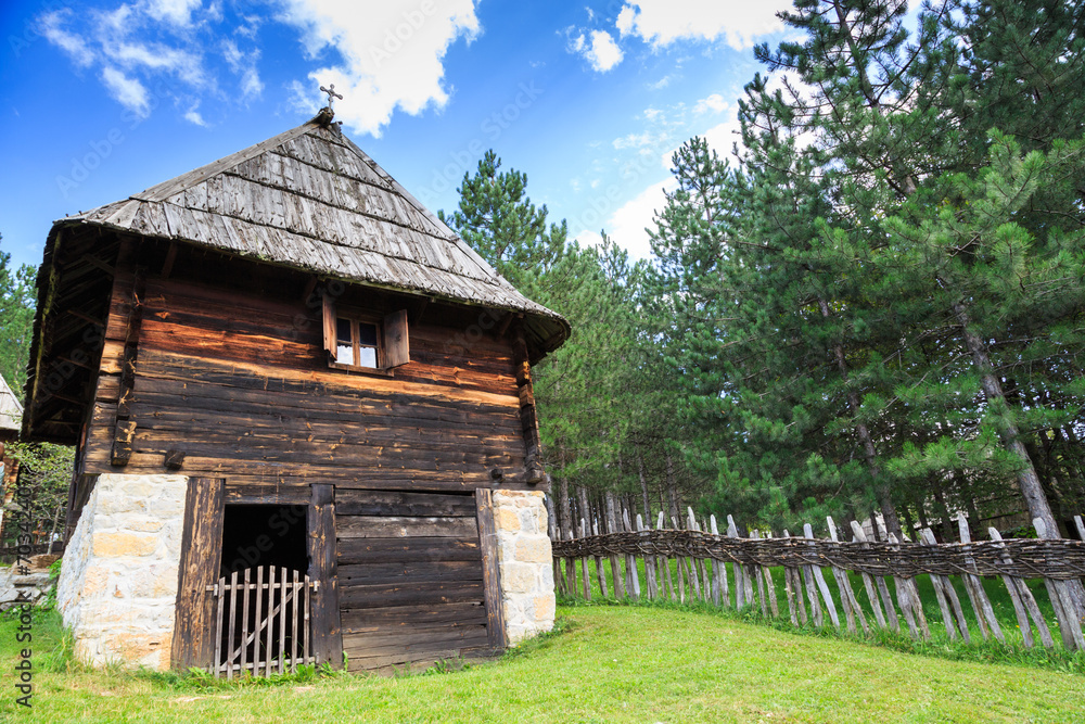 Old traditional house on the mountain in the summer Old traditional house on the mountain in the summer