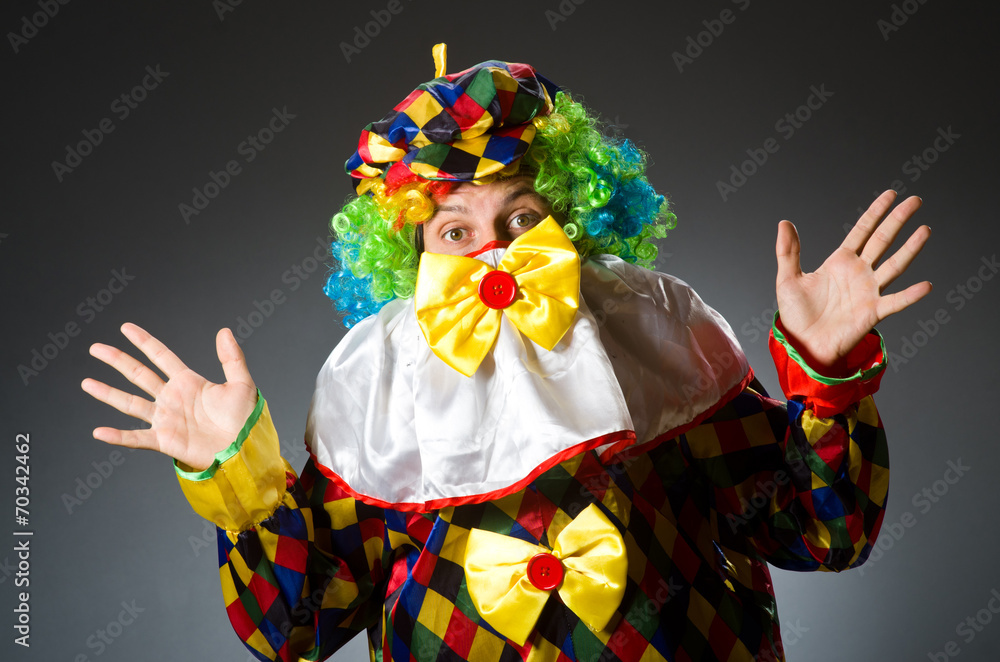 Funny clown in colourful costume Funny clown in colourful costume