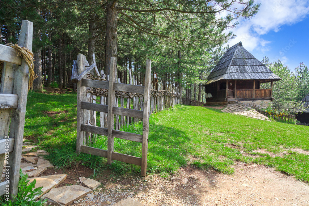 Old traditional house on the mountain in the summer Old traditional house on the mountain in the summer