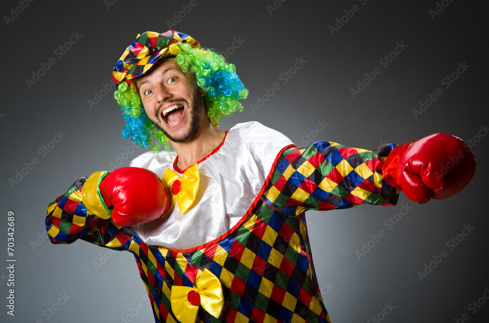 Funny clown with boxing gloves Funny clown with boxing gloves