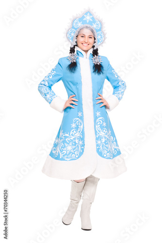Young brunette in snow maiden costume