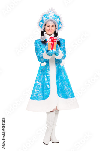 Pretty woman in a suit of snow maiden