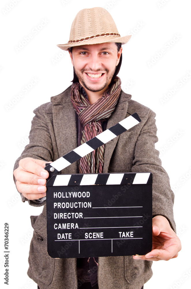 Man with movie clapperboard and hat