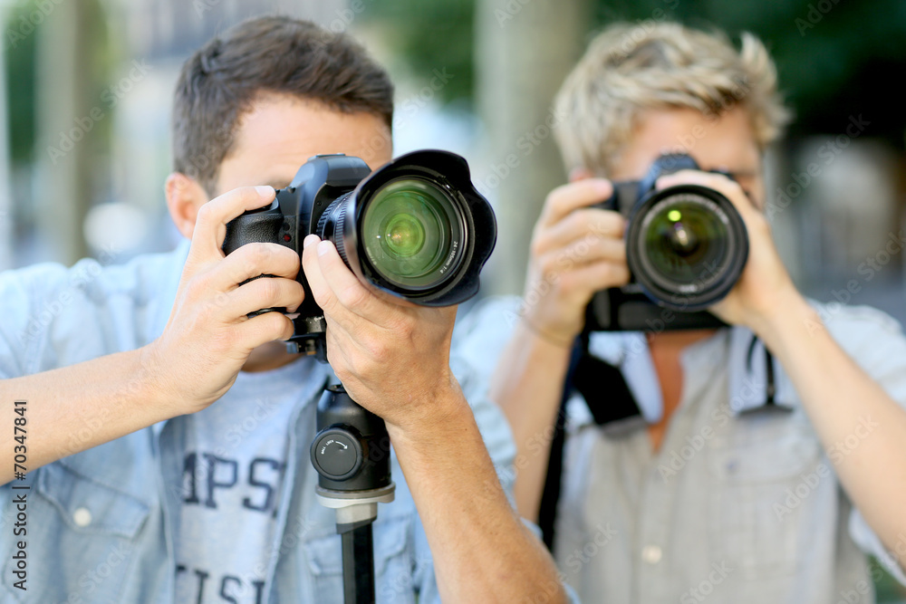 Young men on a photography training day Young men on a photography training day