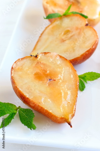Baked pears and apples with butter and sugar