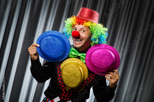  Funny clown in humorous concept against curtain