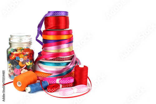 Colorful ribbons, sewing, craft and haberdashery items photo