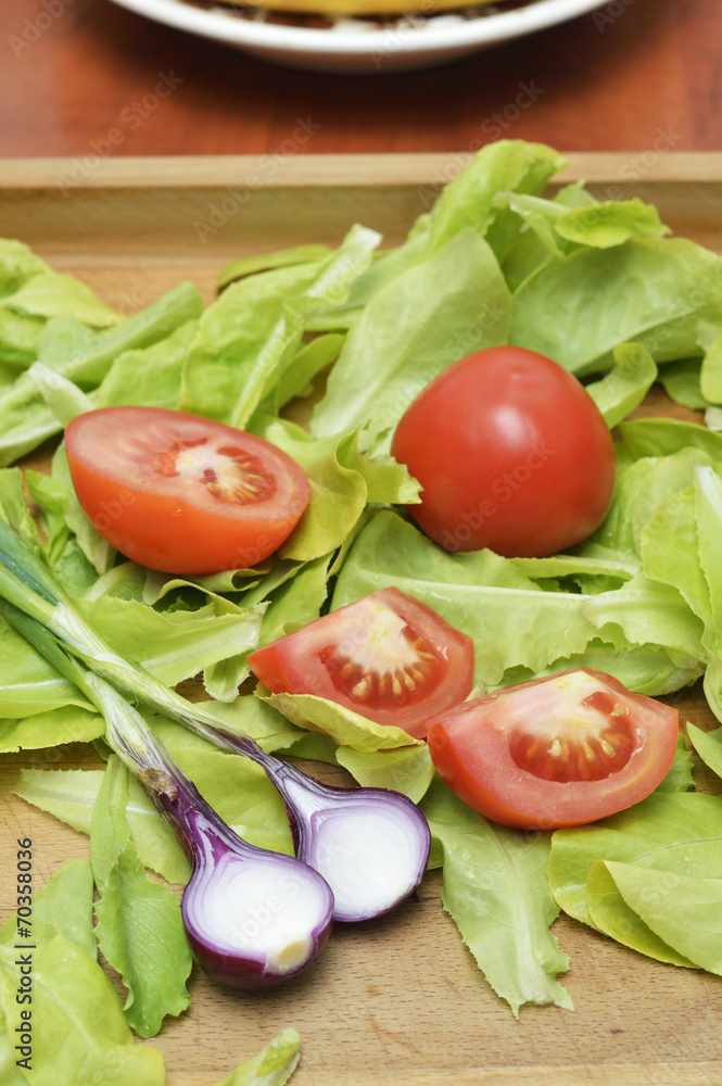 Fresh green salad with tomato and onion Fresh green salad with tomato and onion