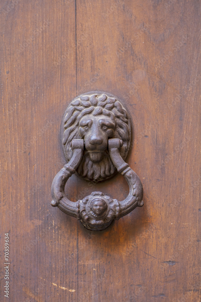 knocker door medieval style in the city of Toledo, Spain knocker door medieval style in the city of Toledo, Spain