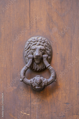 knocker door medieval style in the city of Toledo, Spain