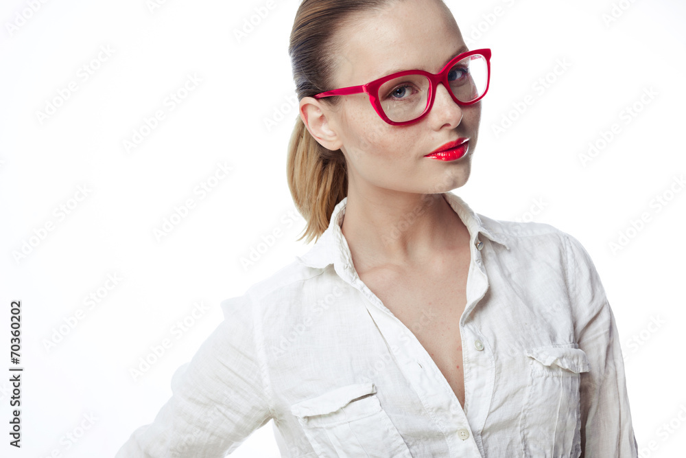 Business woman in glasses and a bright white shirt on a white ba