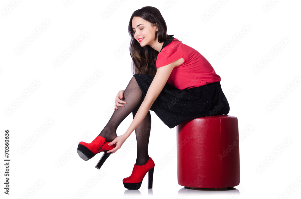 Woman trying new shoes isolated on the white