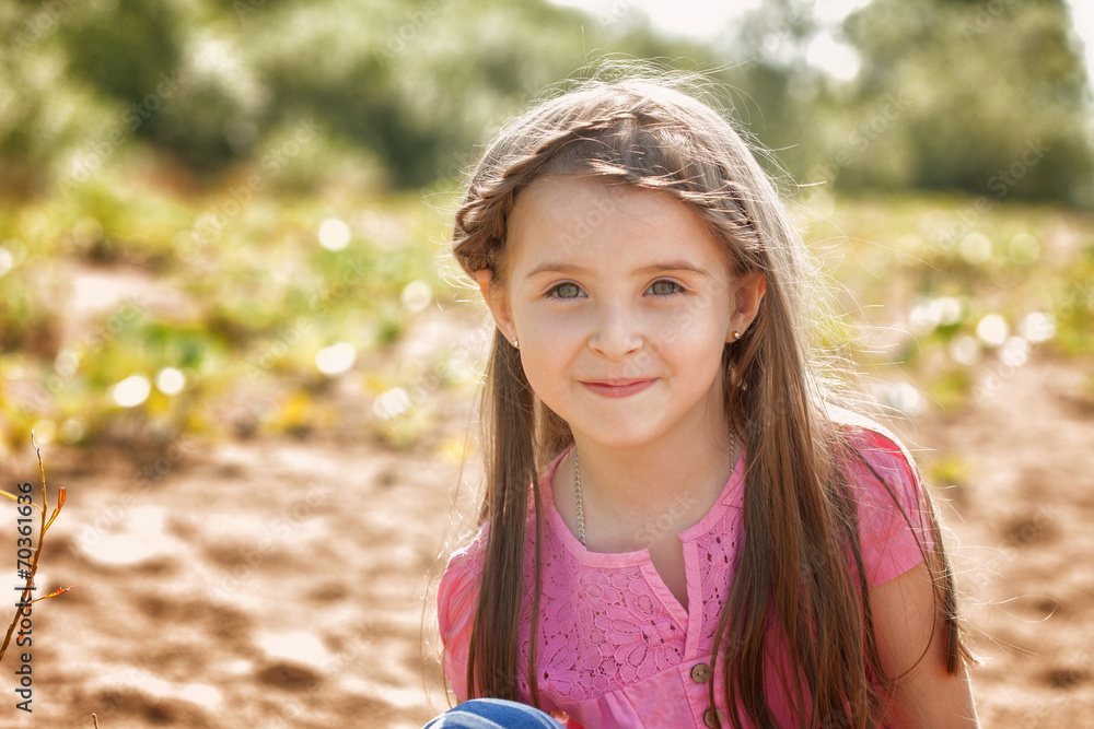 Portrait of attractive little girl in park Portrait of attractive little girl in park