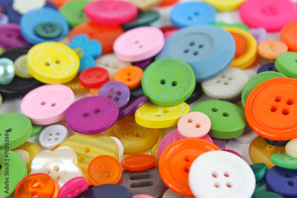 Pile of brightly coloured haberdashery buttons Pile of brightly coloured haberdashery buttons