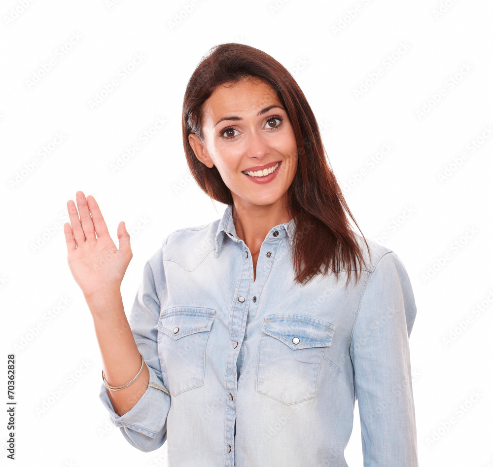 Confident young lady with greeting hand Confident young lady with greeting hand