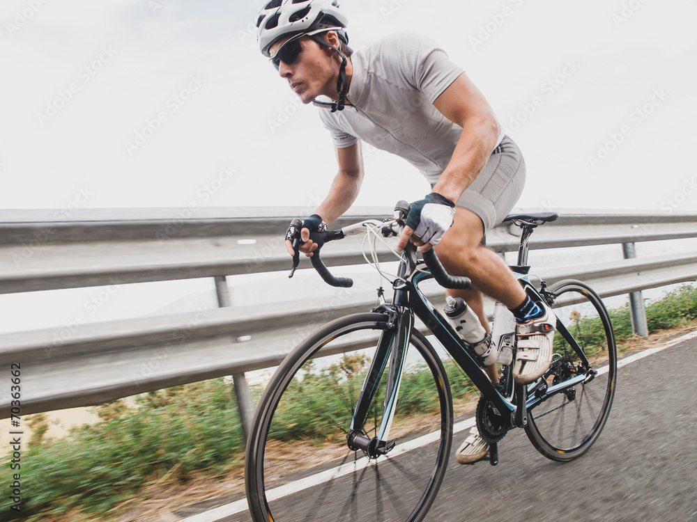 Fototapeta Cyclist in maximum effort