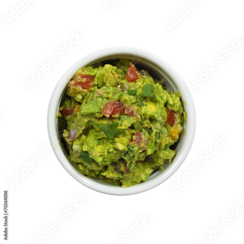 Bowl of Guacamole dip and nachos isolated on white background