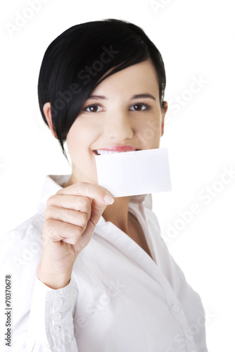 Beautiful smiling businesswoman with businesscard