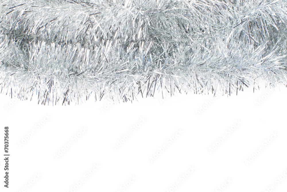 Festive background with silver garland to insert text. Festive background with silver garland to insert text.