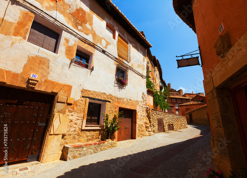 Sunny street of old spanish town in summer