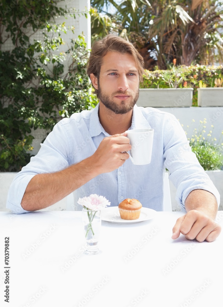 Thoughtful man having a coffee Thoughtful man having a coffee