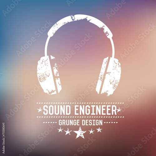 Earphone badge grunge symbol on blur background