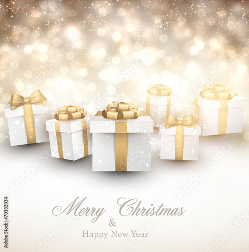 Golden winter background with christmas gifts.