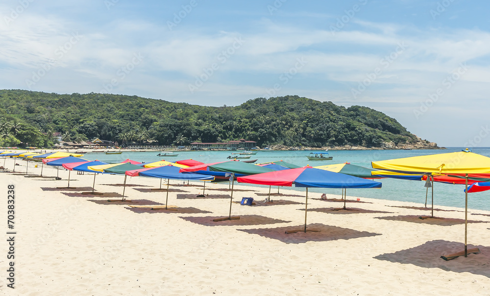 Tropical beach with shade umbrella