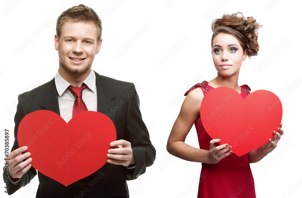 young sensual woman and handsome man holding red heart on white young sensual woman and handsome man holding red heart on white