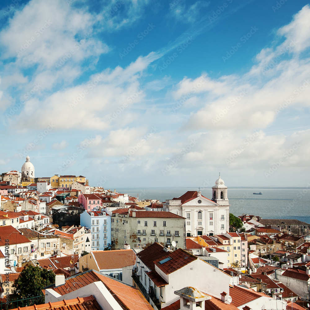 Beautiful view of old city from Alfama with cloudy sky. Lisbon,