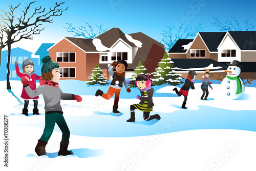 Kids playing snow ball fight