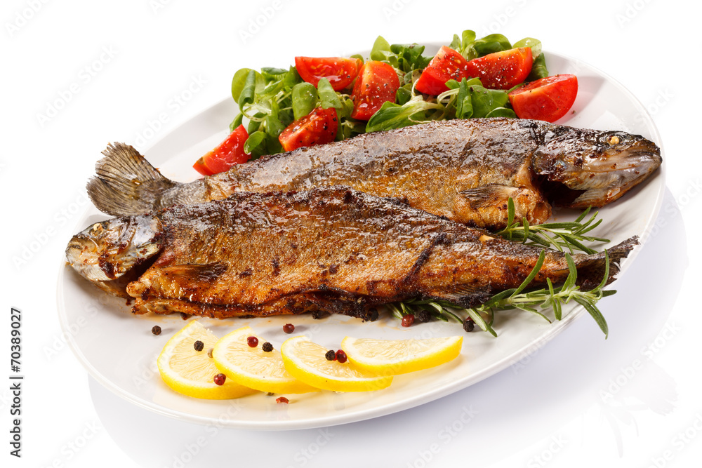 Fish dish - fried fish fillet with vegetables Fish dish - fried fish fillet with vegetables