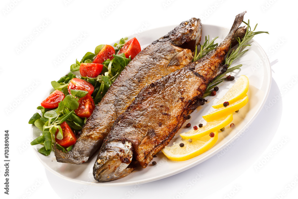 Fish dish - fried fish fillet with vegetables Fish dish - fried fish fillet with vegetables